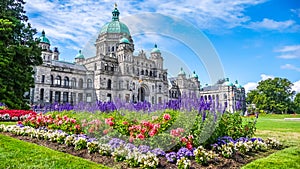 Historic parliament building in Victoria with colorful flowers, Vancouver Island, British Columbia, Canada