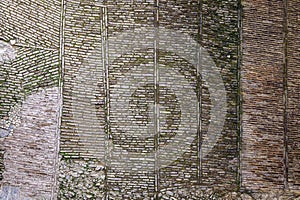 Historic paving with baked clinkers in La Alcazaba, Malaga, the Moorish fortification, construction from the 9th century