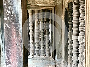 Historic pillars. Ancient architecture. Angkor Wat . Hindu Temple . Siem Reap. Cambodia.