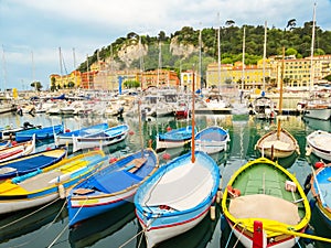 Historic port area of Nice. Fishing boats in the Port of Nice, France photo