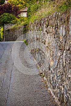 historic protection wall of castle next to path