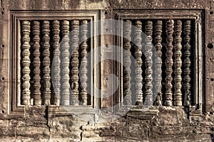 Historic rock carved spindles at Angkor wat temple, Amazing architecture built in 11th century