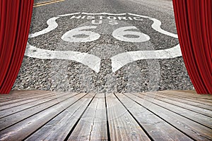 Historic Route 66 sign painted on asphalt of highway in Arizona - California