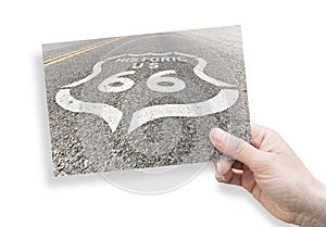 Historic Route 66 sign painted on asphalt of highway in Arizona - California - Concept