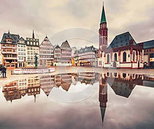 The historic RÃ¶merberg in Frankfurt am Main with the historic half-timbered church and the town hall. Sightseeing