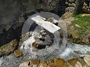 Historic sacred hot water flowing
