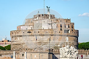 Historic sights of building architecture Castel Sant'Angelo in Rome, on the banks of the Tiber River near the arched bridge across