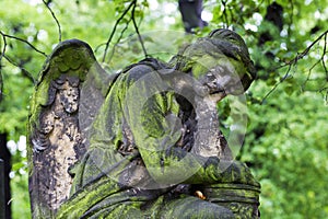 Historic Statue on the mystery old Prague Cemetery, Czech Republic