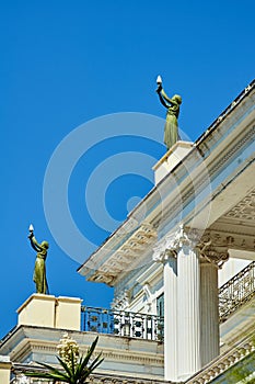 Historic statues on the front of the palace Achilleon in island of Corfu photo