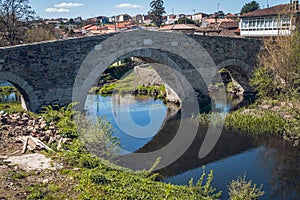 Historic stone bridge near Mellid, Galicia, Spain photo