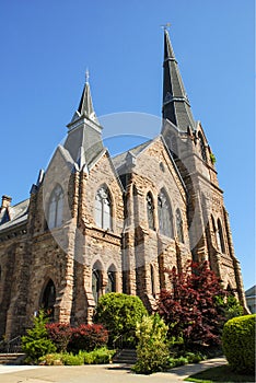 Historic Stone Church Steeples Blue Sky photo