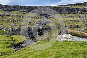 Historic stone house with turf roof , Faroe Islands