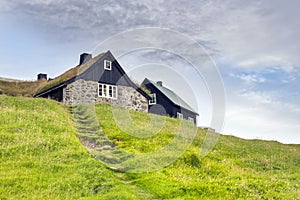 Historic stone house with turf roof , Faroe Islands