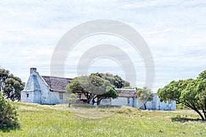 Historic thatched roof building at the entrance to Struisbaai