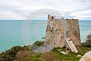 Historic Torre di Monte Pucci, a Saracen signal tower at the coast of Gargano, Italy