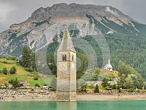 Historic Tower of Sunken Church near Lago di Resina in South Tyrol photo