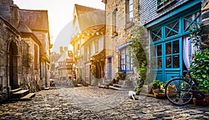 Historic town in Bretagne, France at sunset photo