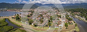 Aerial view panorama to historic town Paraty with green mountains in background on a sunny day, Brazil, Unesco World Heritage