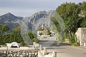 The historic town of Kotor, Montenegro, unfolds along the shores of the Adriatic, embraced by dramatic mountains and the tranquil