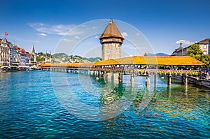 Historic town of Lucerne with famous Chapel Bridge, Switzerland photo