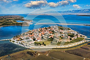 Historic town of Nin laguna aerial view with Velebit mountain background, Dalmatia region of Croatia. Aerial view of the famous