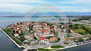 Historic town of Nin laguna aerial view with Velebit mountain background, Dalmatia region of Croatia. Aerial view of the famous