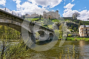 Historic town of Puebla de Sanabria from the Tera river shore photo