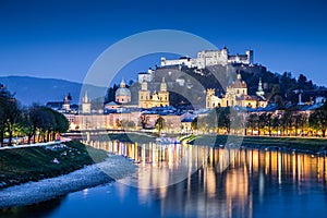 Historic town of Salzburg with Salzach river at dusk, Austria