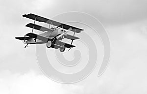 Historic triplane on the sky.