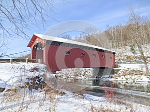 Historic West Arlington Covered Bridge in the winter in Vermont