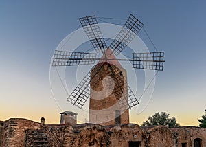 historic windmill in the country town of Algaida in the interior of Mallorca at sunrise