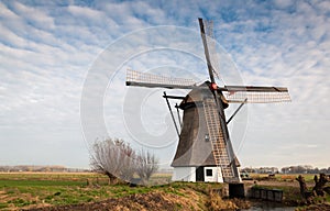 Historic windmill in a Dutch polder landscape