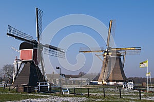 Historic windmills against a winter sky