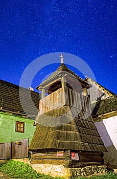 Historic wooden belfry in rural UNESCO  village Vlkolinec in Slovakia