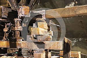 Historic wooden salt extraction machine in a salt mine Turda, Romania