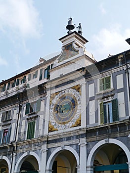 A historical astronomical clock in Brescia in Ita