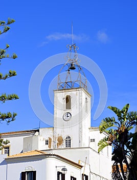 The historical bell tower of Torre de Relogio in Albufeira photo