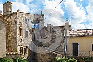 Historical building from stone in the old town of Buje. Istria, Croatia