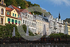 Historical buildings and bridge over the river Tepla in Karlovy