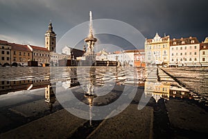 Historical city Ceske Budejovice in the Czech Republic in the evening after summer rain reflect in water