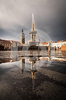 Historical city Ceske Budejovice in the Czech Republic in the evening after summer rain reflect in water