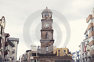 Historical clock tower and fountain in the streets of Canakkale