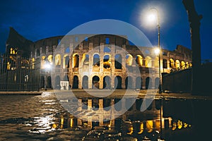 Historical Colosseum building in Rome, Italy at night