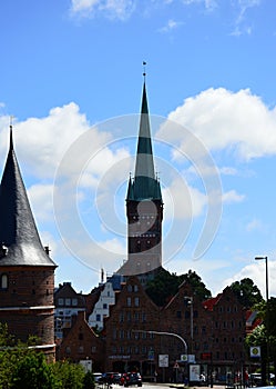 Historical Holsten Gate and Cathedral in Spring in the Old Town of the Hanse City of Luebeck, Schleswig - Holstein