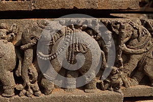 Historical intricate architecture motifs on somnathpura temple india photo