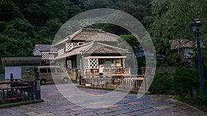 Historical Japanese House along River photo