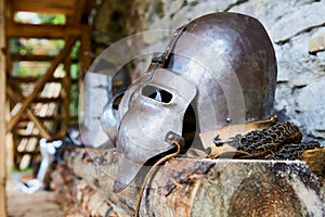 Historical knight`s helmet close up. Knight`s clothing.