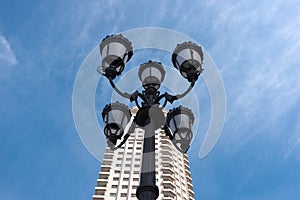 Historical lamp on Plaza de Espana, Madrid, Spain photo