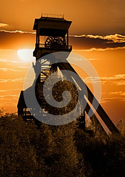 Historical mine tower in sunset Maasmechelen Belgium