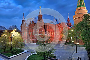 Historical Museum Framed by Trees and Street Lights in Spring Morning